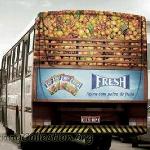 Another nice rear bus ad!   A huge virtual load of fruit.  Colorful bus ads get noticed!