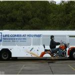 It appears this motorcycle has lost a tire!  Very nice design in the "Life comes at you fast" series of bus ads. 

Perhaps we could design an ad for your business!  Give us a call at 989 345-4875.